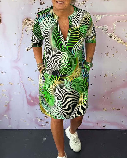 Women's V-Neck Dress with Colorful Print and Flowy Design