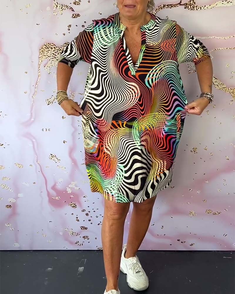 Women's V-Neck Dress with Colorful Print and Flowy Design