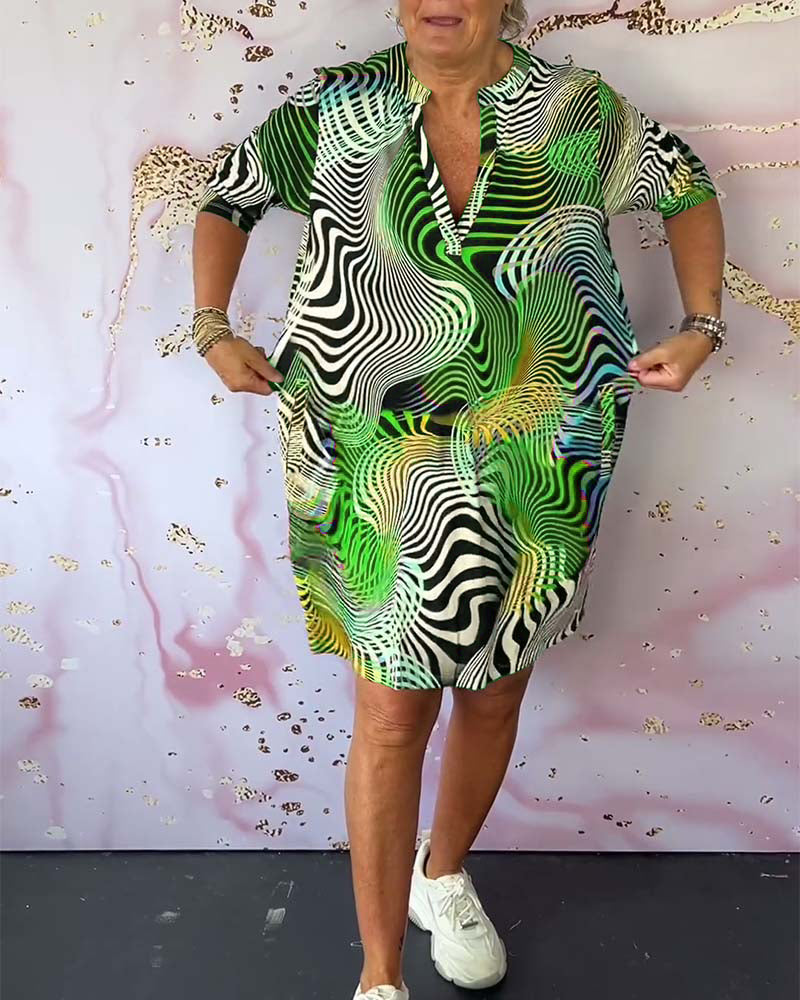 Women's V-Neck Dress with Colorful Print and Flowy Design