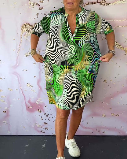 Women's V-Neck Dress with Colorful Print and Flowy Design