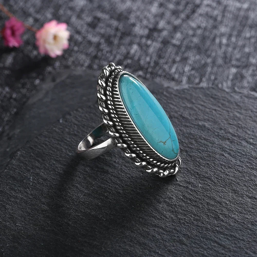 Women's Turquoise Ring with Adjustable Band and Unique Design