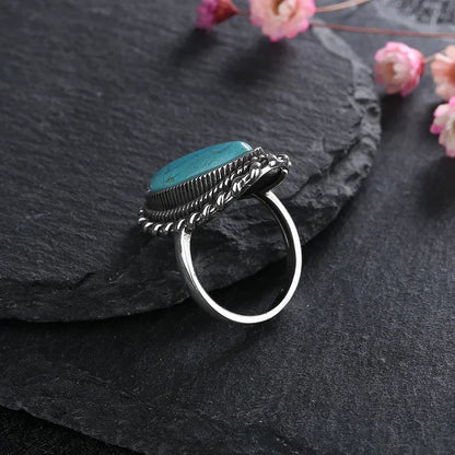 Women's Turquoise Ring with Adjustable Band and Unique Design