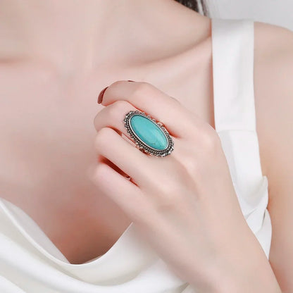 Women's Turquoise Ring with Adjustable Band and Unique Design
