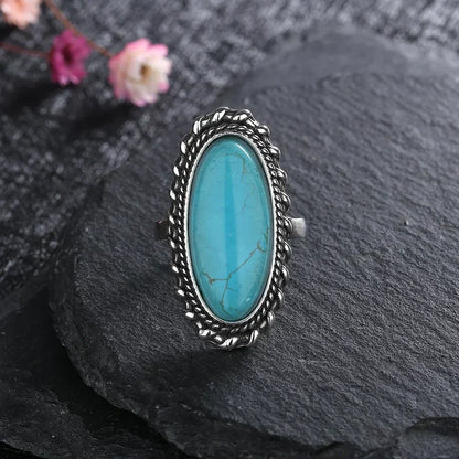 Women's Turquoise Ring with Adjustable Band and Unique Design