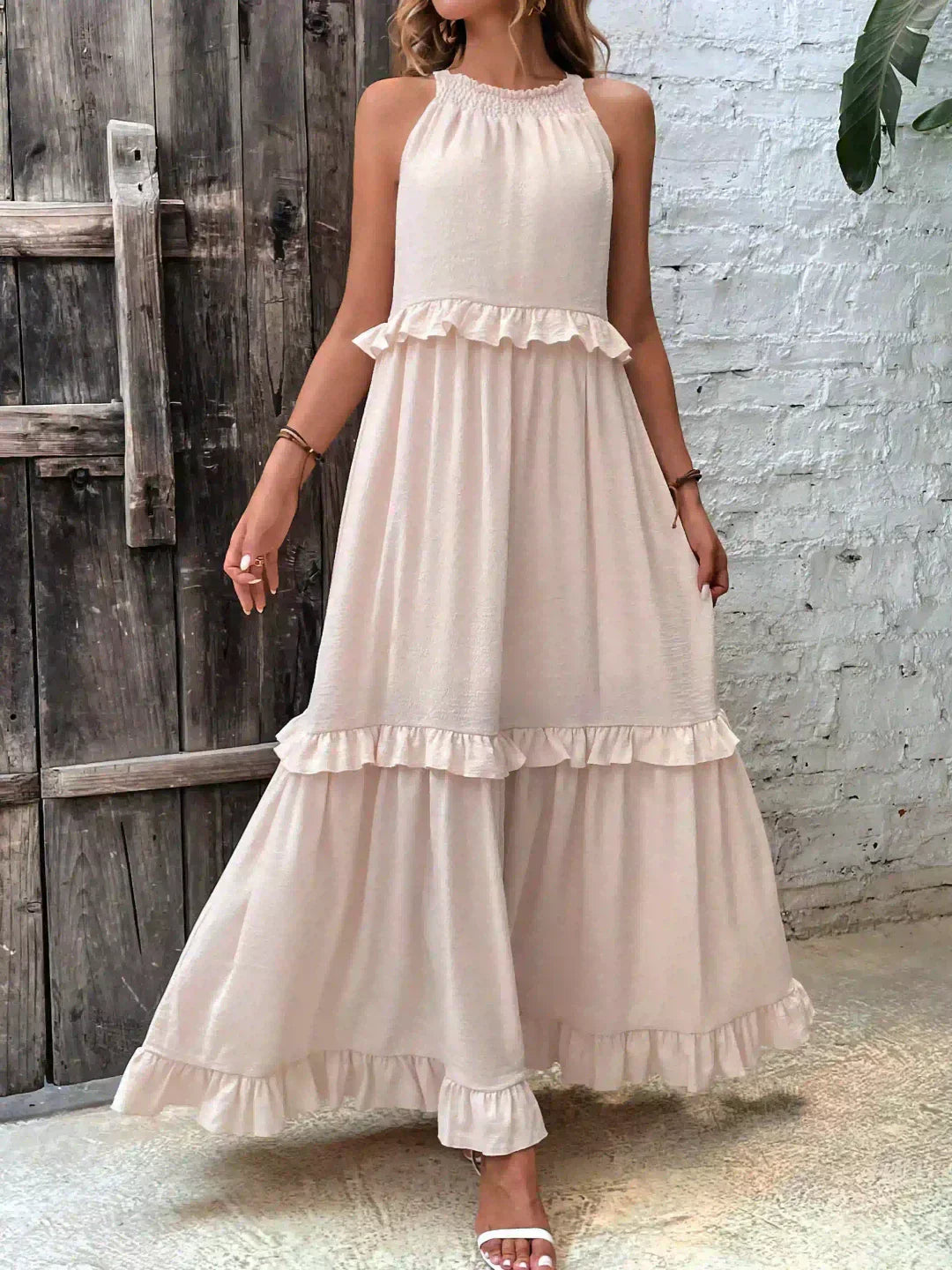 Women's Sleeveless Dress with Ruffles and Flowy Design